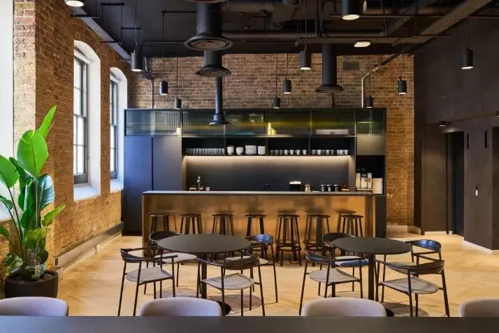 Café floor, mid-morning